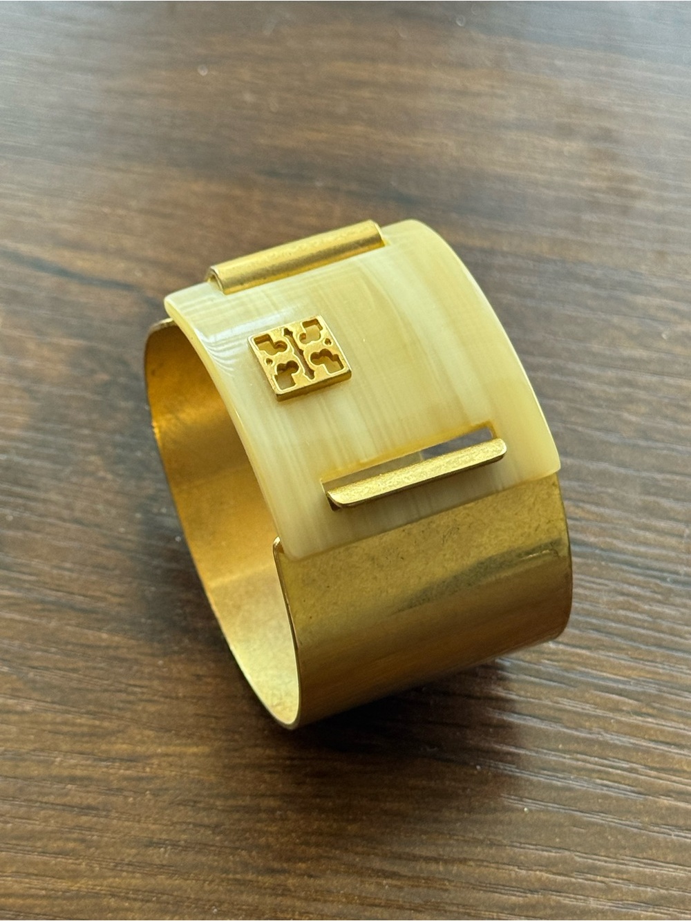 Elegant Gold Tory Burch Cuff Bracelet with Cream Inset and Logo Accent